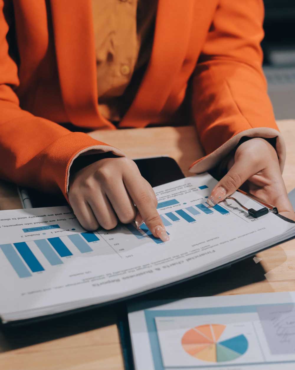 Business professionals reviewing financial charts during a client consultation, delivering trusted cpa boca raton accounting services